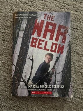 Scholastic The War Below – Black & Red Cover